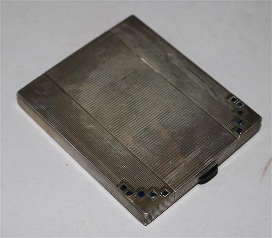 A 1930s Art Deco silver & blue stone set cigarette case, 3.25in.